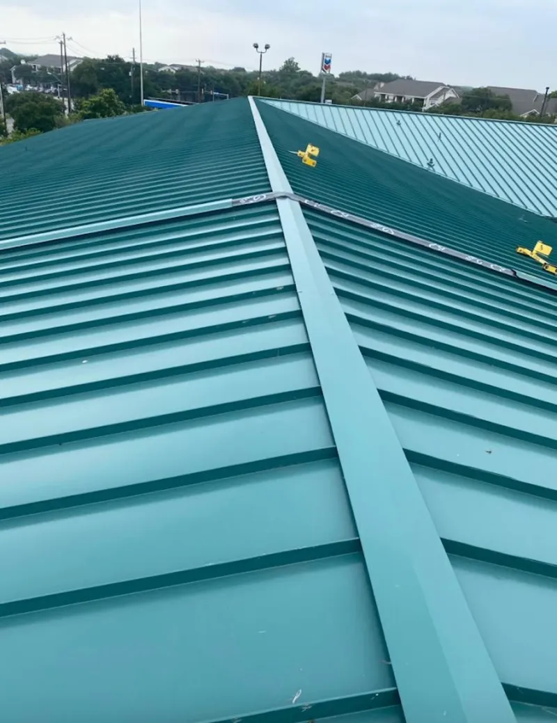 Green commercial metal roof ridge and valley for Metal Roof Repair in South Riding